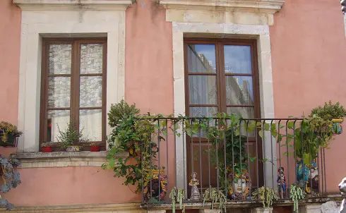 A pretty balcony in Taormina with hand-made ceramics