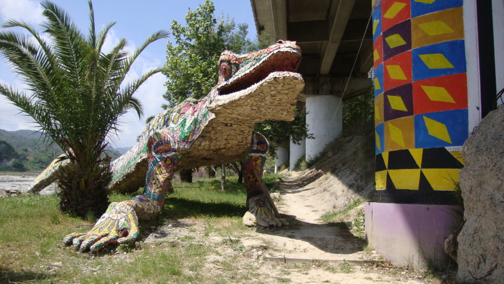 Art sculptures including a mosaic lizard