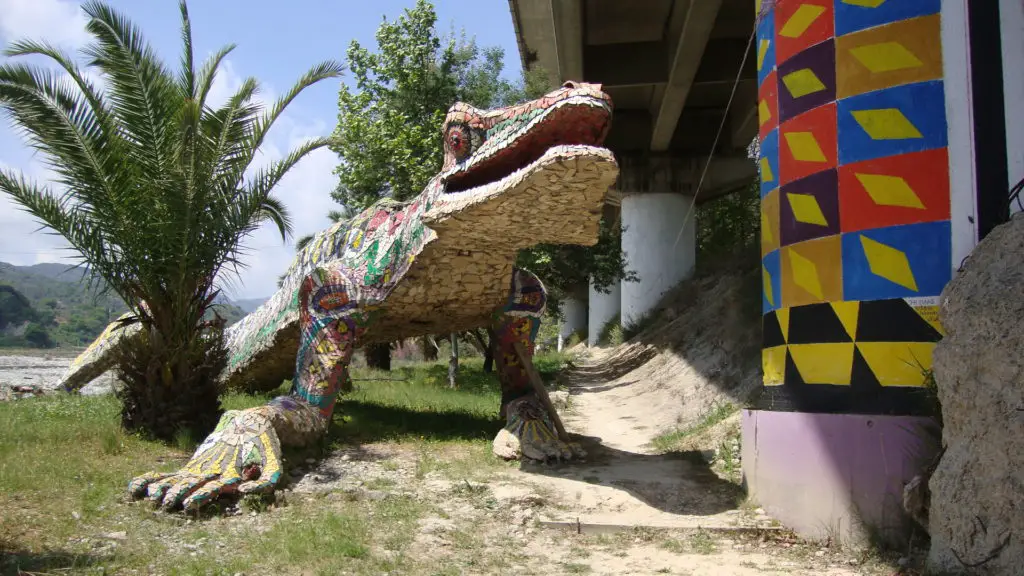 Art sculptures including a mosaic lizard