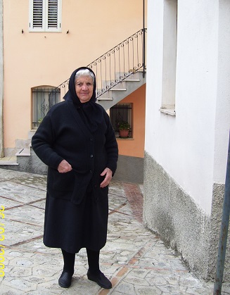 an elderly lady dressed in black showed true Calabrian hospitality