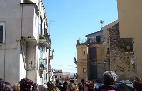 Crowds following a religious procession.