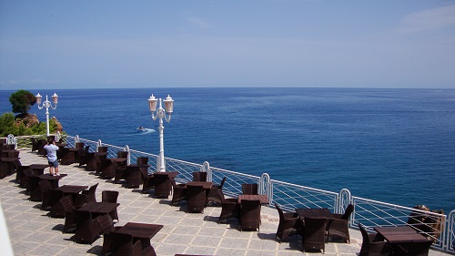 The breakfast terrace in a hotel in Cefalù.