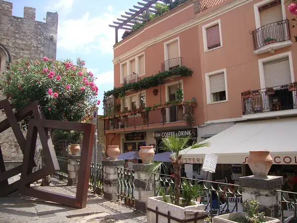 A pretty street in Taormina with ceramic vases made from terracotta